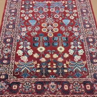 Red Floral Tribal Design Hand Knotted Wool Carpet - 5FT X 7FT | 150CM X 210CM